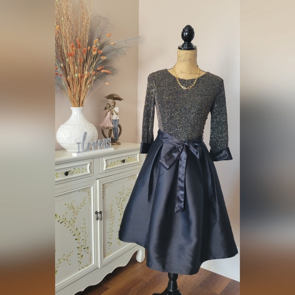 Elegant Black and Gold Dress with Satin Bow